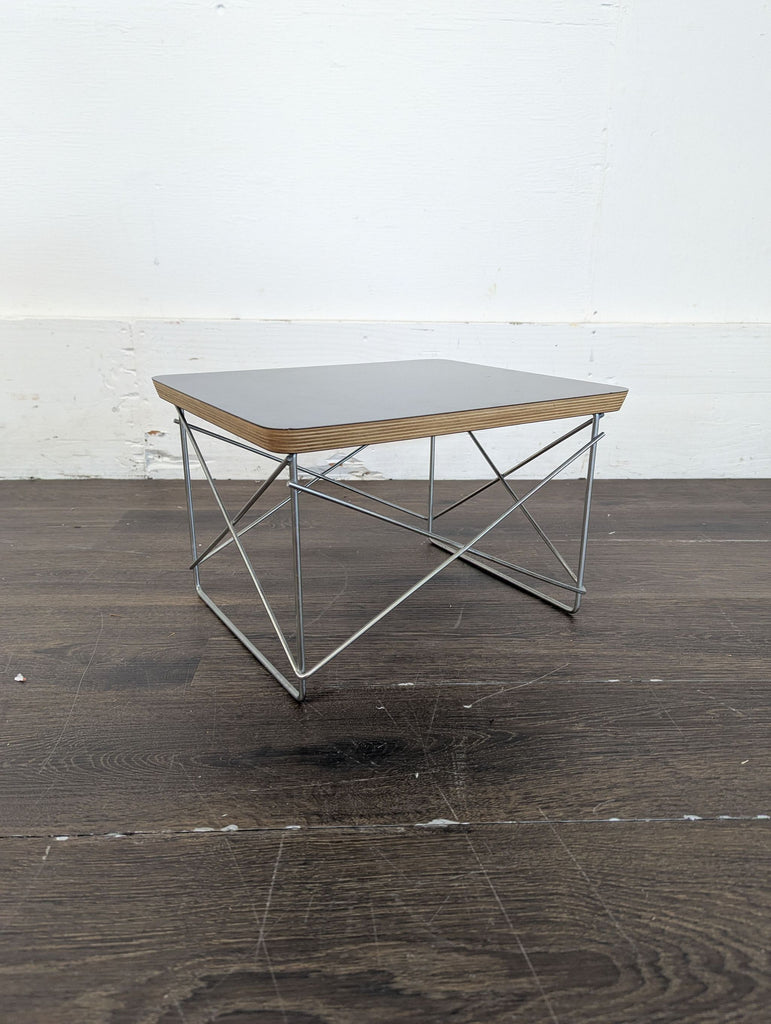 2. Compact wooden bench with integrated entertainment storage and a folding end table on the side.