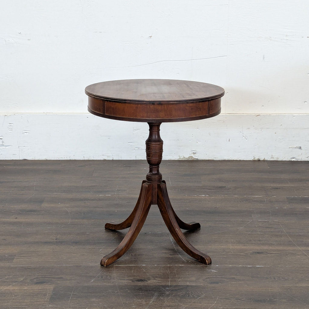 2. Elegant glass-top end table featuring a metal frame and decorative lower shelf for extra storage.