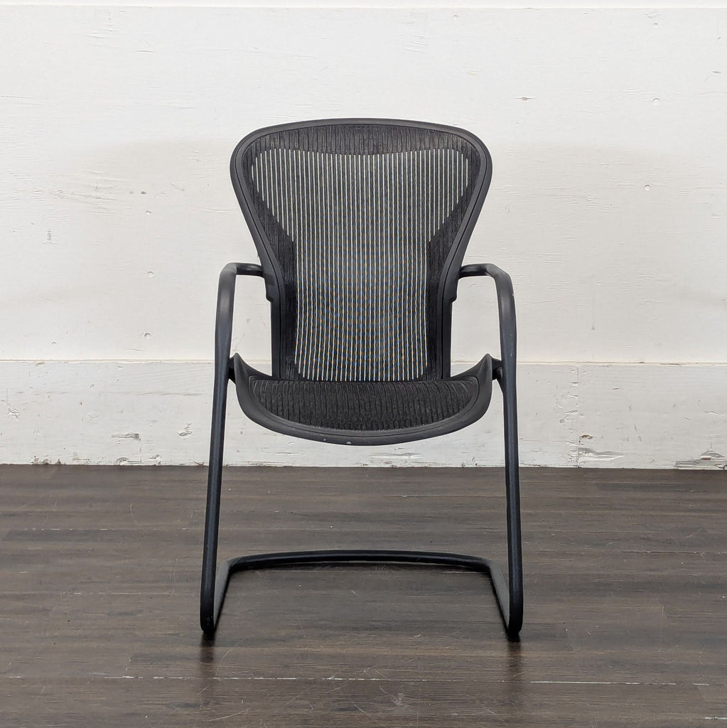 1. Ergonomic Herman Miller office chair with mesh backrest, designed for modern workspace comfort and support.  