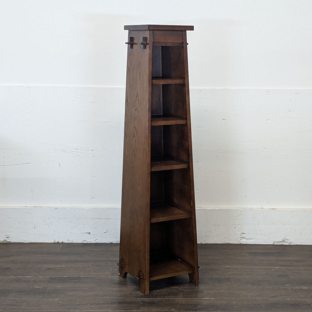 2. Tall, minimalist bookshelf featuring clean lines and open shelving for books and decorative items.