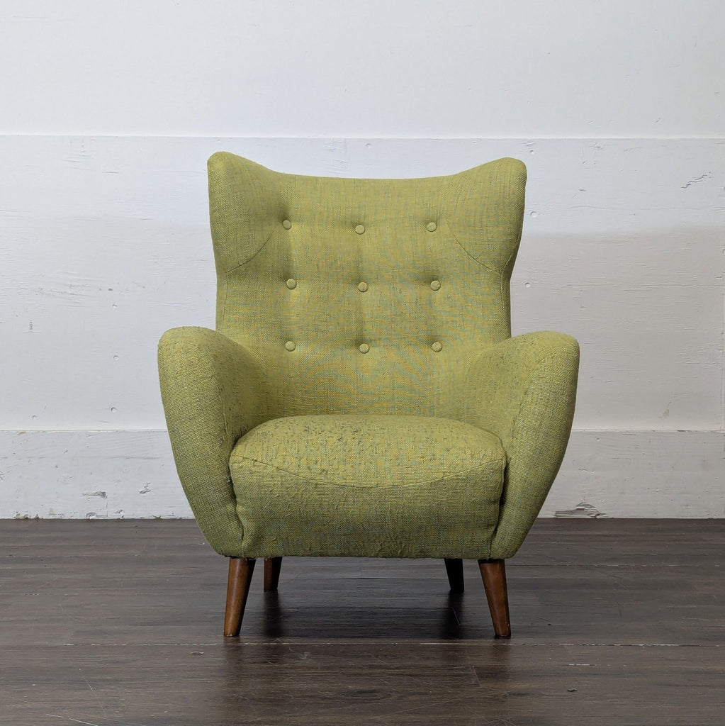 1. Modern lounge chair with plush cushions on a wooden frame, perfect for relaxing in living spaces.