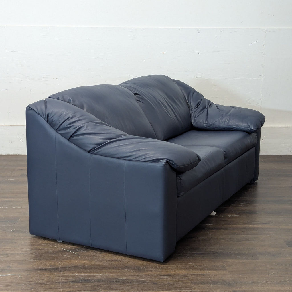 2. Stylish Krause's brand sleeper sofa shown in a folded-out bed position, set against a neutral wall.