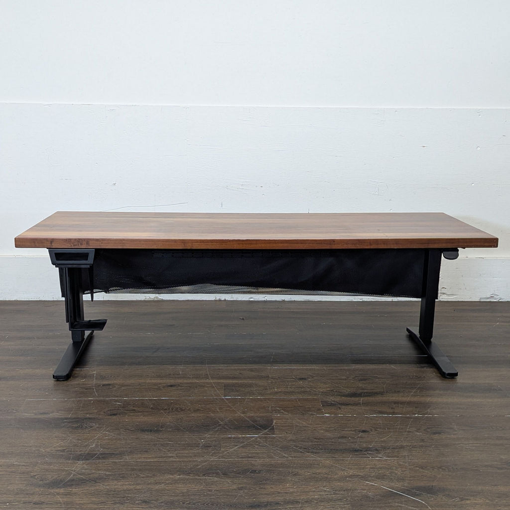 1. Uplift custom hard top desk with extra-long surface, ideal for spacious office setups.