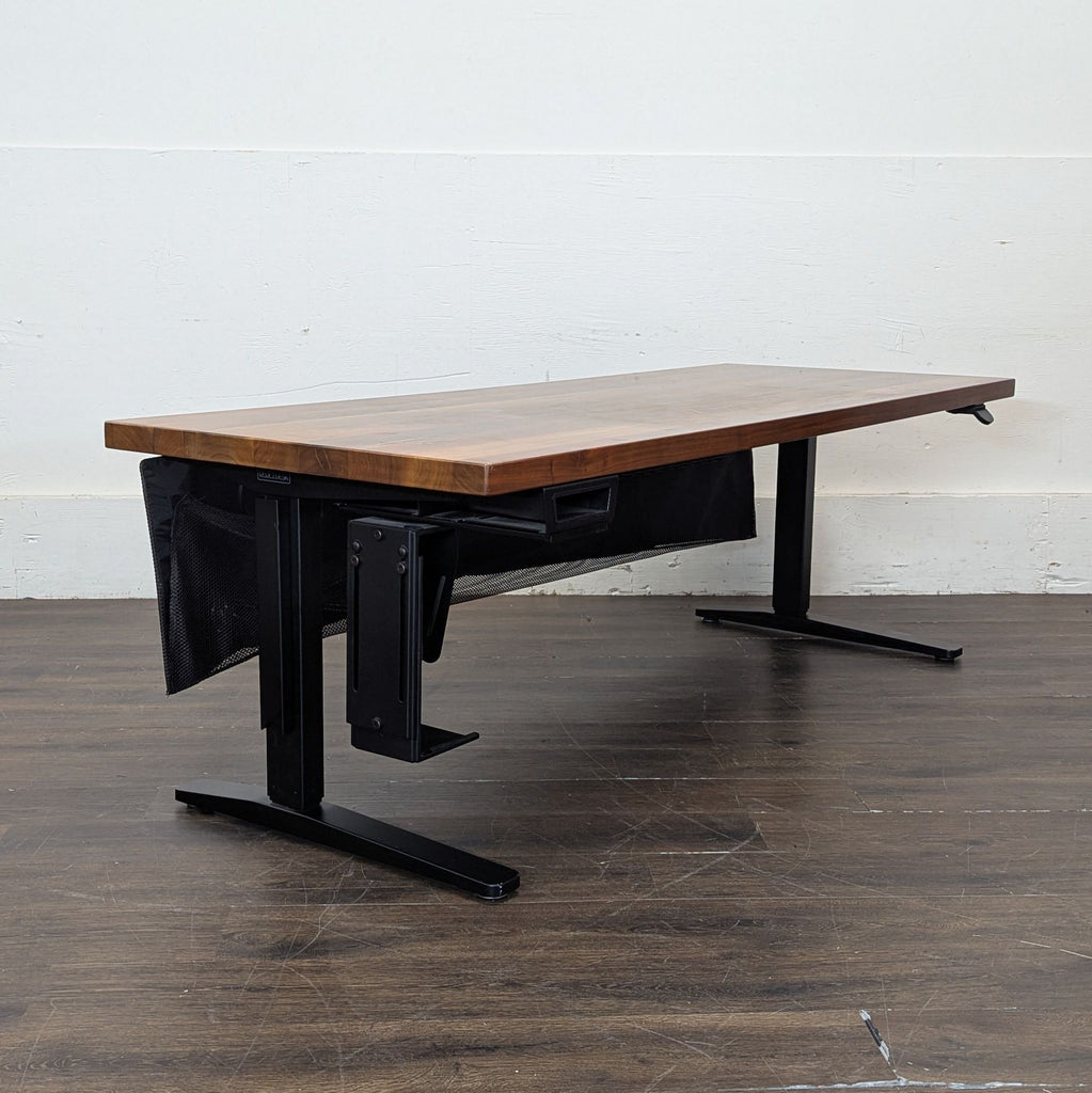 2. Modern Uplift desk featuring a very long worktop and sturdy legs, perfect for productivity.