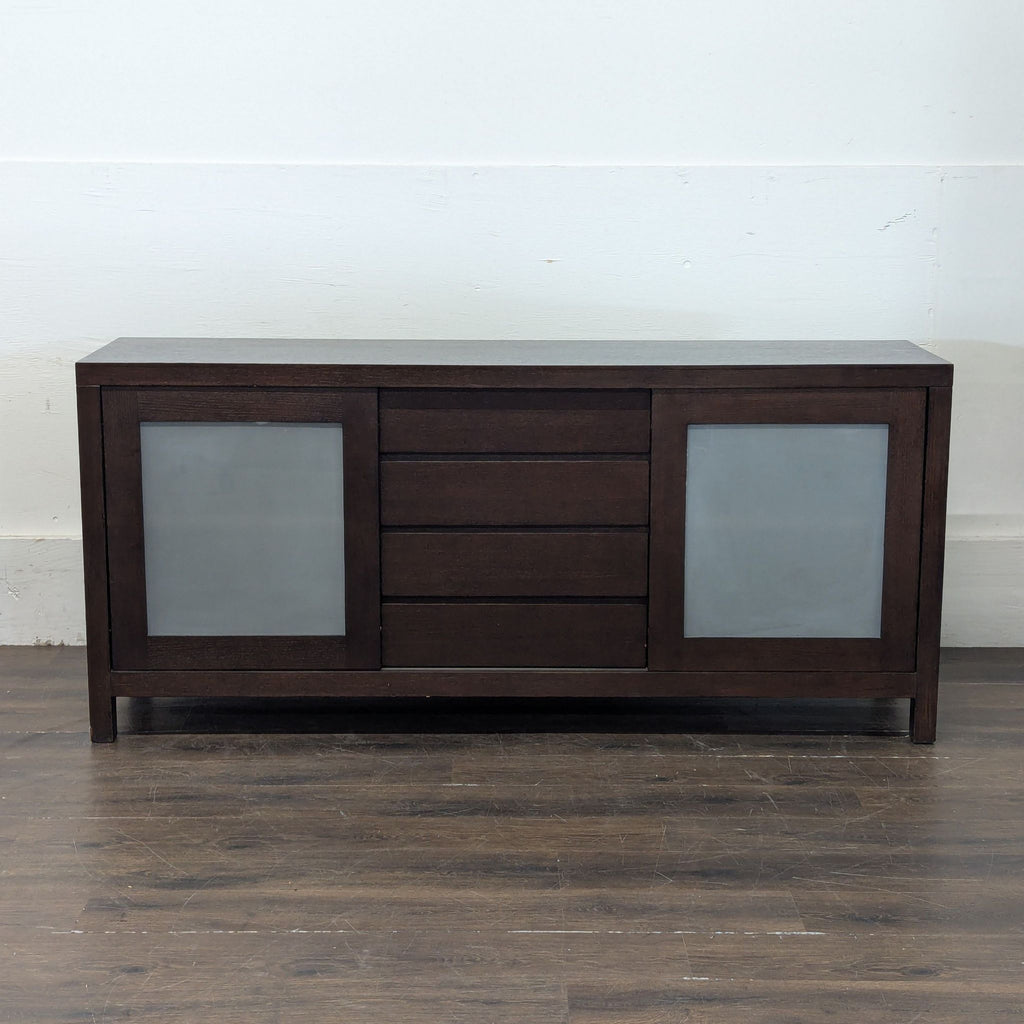 Modern Crate and Barrel credenza featuring sliding doors; reveals extra interior shelving for organization.  