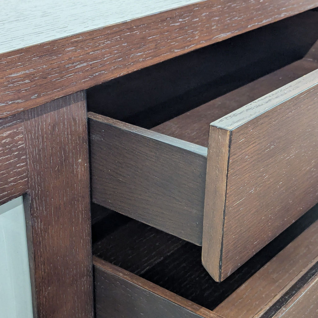Crate and Barrel side board. Doors slide open to reveal additional shelves.