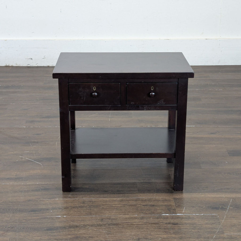 3. Modern end table by Pottery Barn, perfect for living spaces, includes a spacious tabletop and shelf.