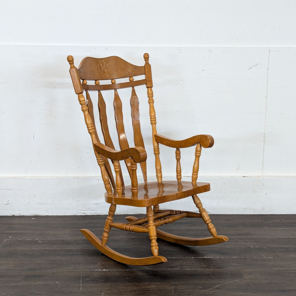 2. Modern rustic rocking chair from the Rocking Chair brand, shown in a cozy living room setting.