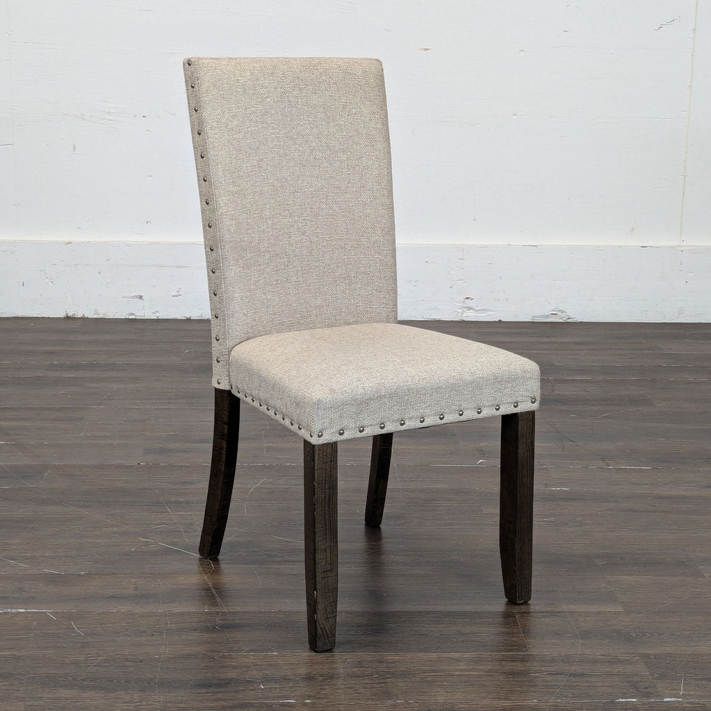 3. Pottery Barn dining chairs, set of four, stylish and sturdy for enhancing any dining space.