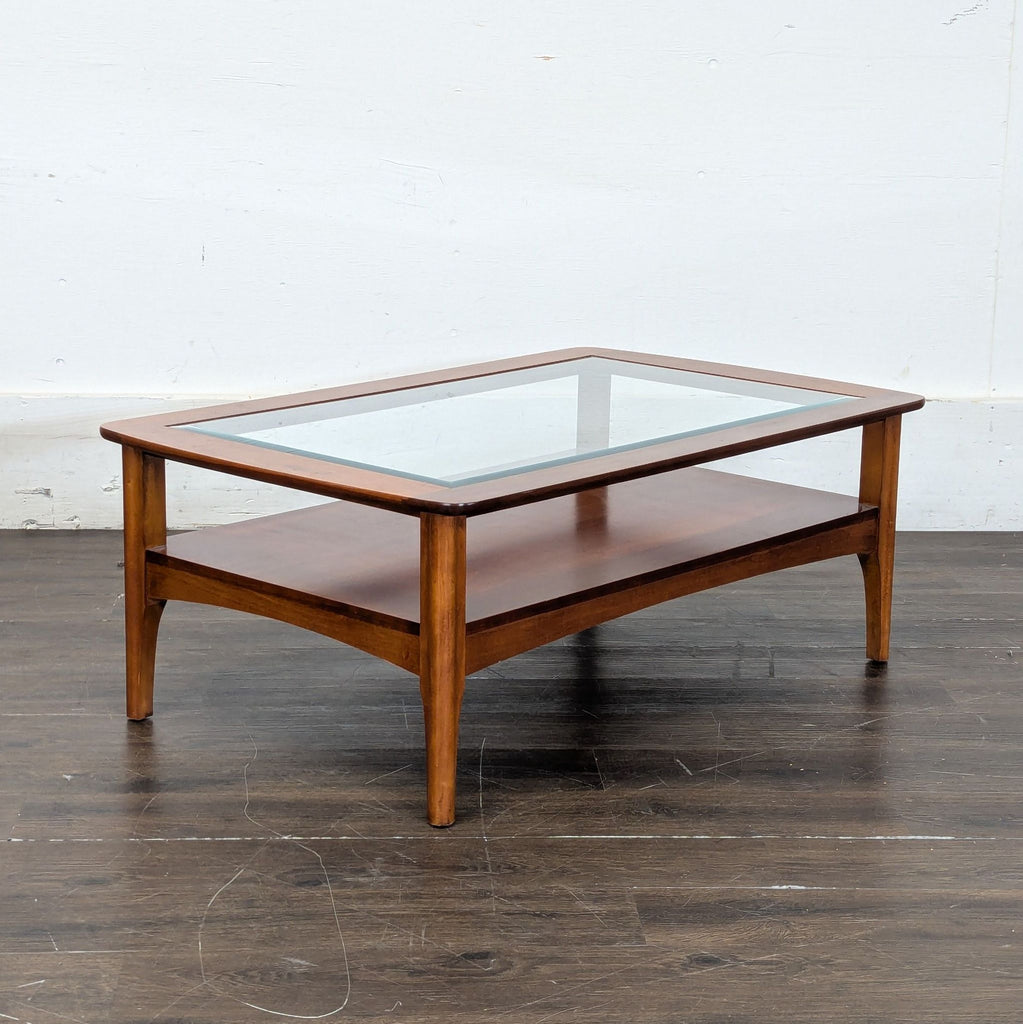 2. Elegant rectangular glass top coffee table showcasing a contemporary living room setup.