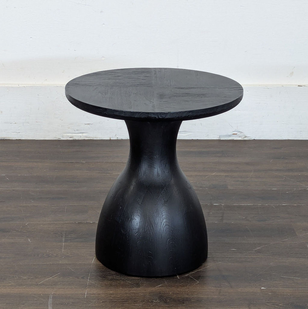 2. Contemporary side table by Arteriors, featuring clean lines and elegant craftsmanship for any space.  