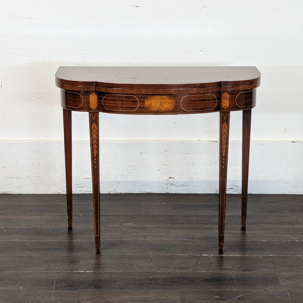 2. Minimalist side table featuring a narrow tabletop and open lower shelf.  