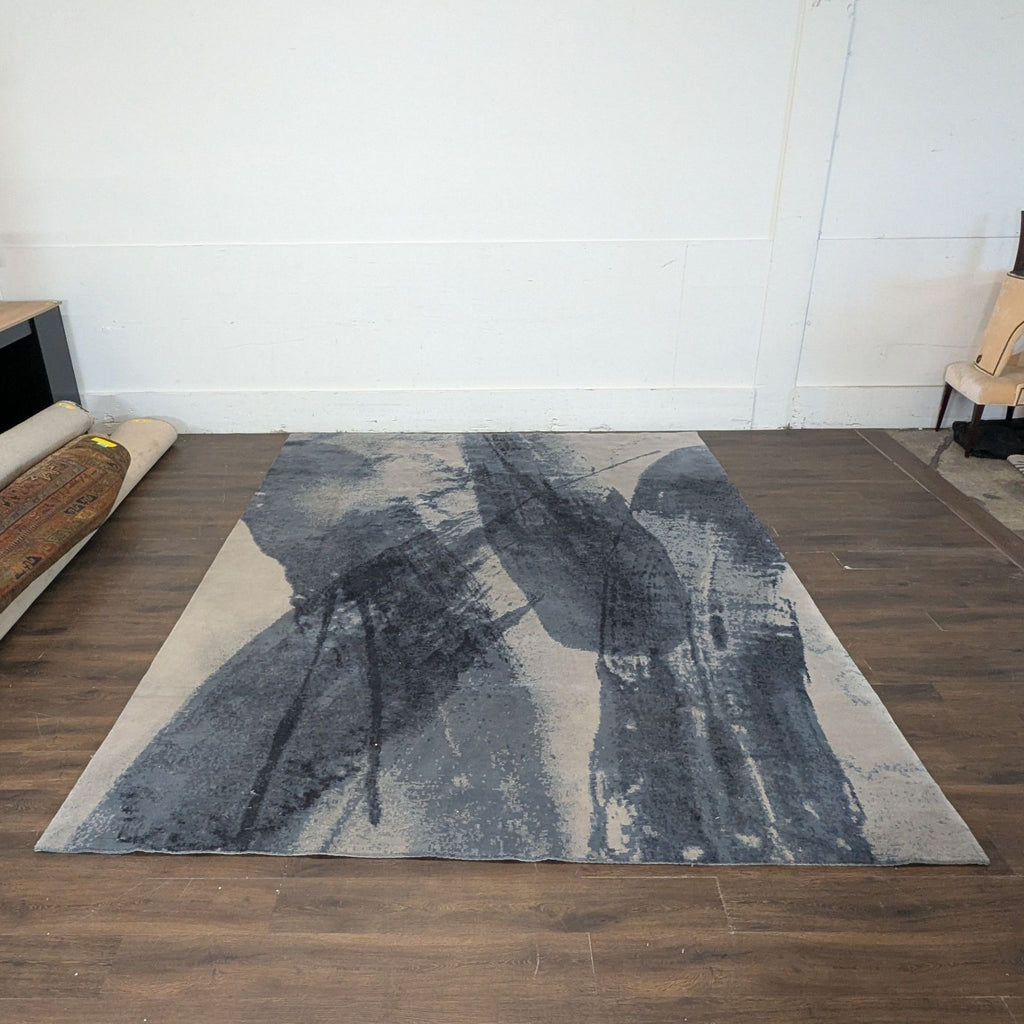 1. Spacious modern rug from Large Rug brand displayed in a contemporary living room.