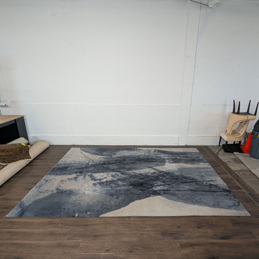 2. Large area rug with subtle patterns, perfect for enhancing home interiors.