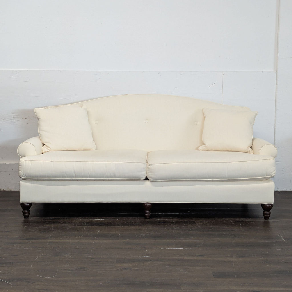 Set of two Thomasville three-seat sofas in neutral upholstery, ready for sale as a bundle.