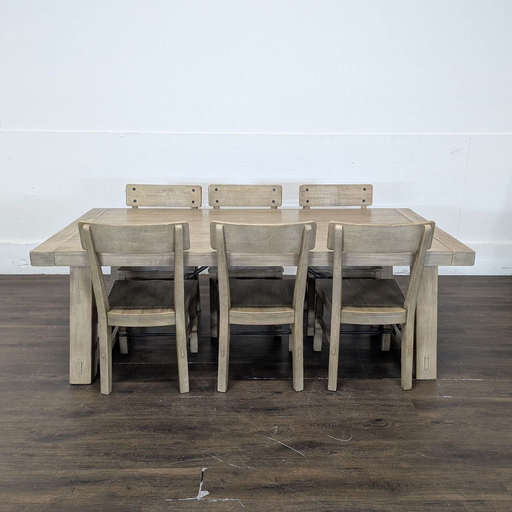 Extended Benchwright Seadrift dining table with seating for six, 2019 Furniture dining set by Pottery Barn.