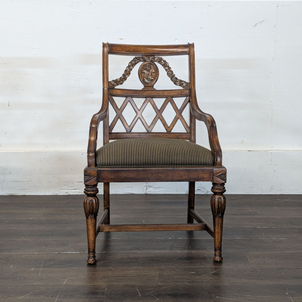 2. Sleek, minimalist dining chair featuring a high back and metal frame, set on a hardwood floor.