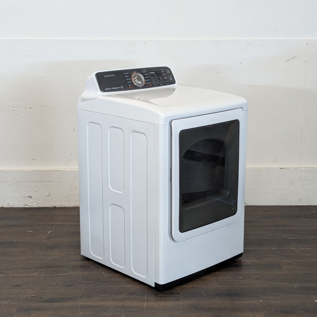 2. Angled side view of a white Samsung washer/dryer showing the door and control console.  
