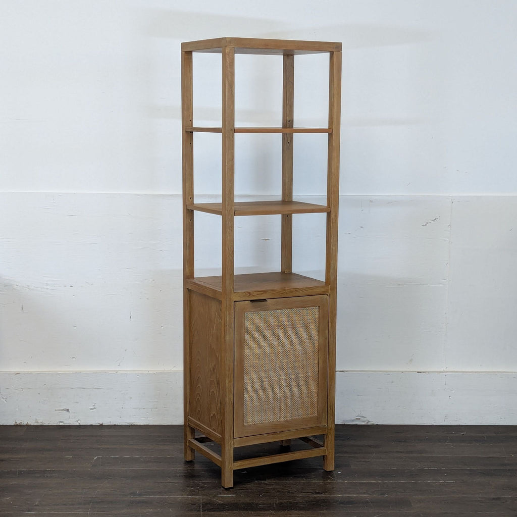Tall Crate & Barrel wooden cabinet featuring open shelving and a closed cane-front storage compartment.