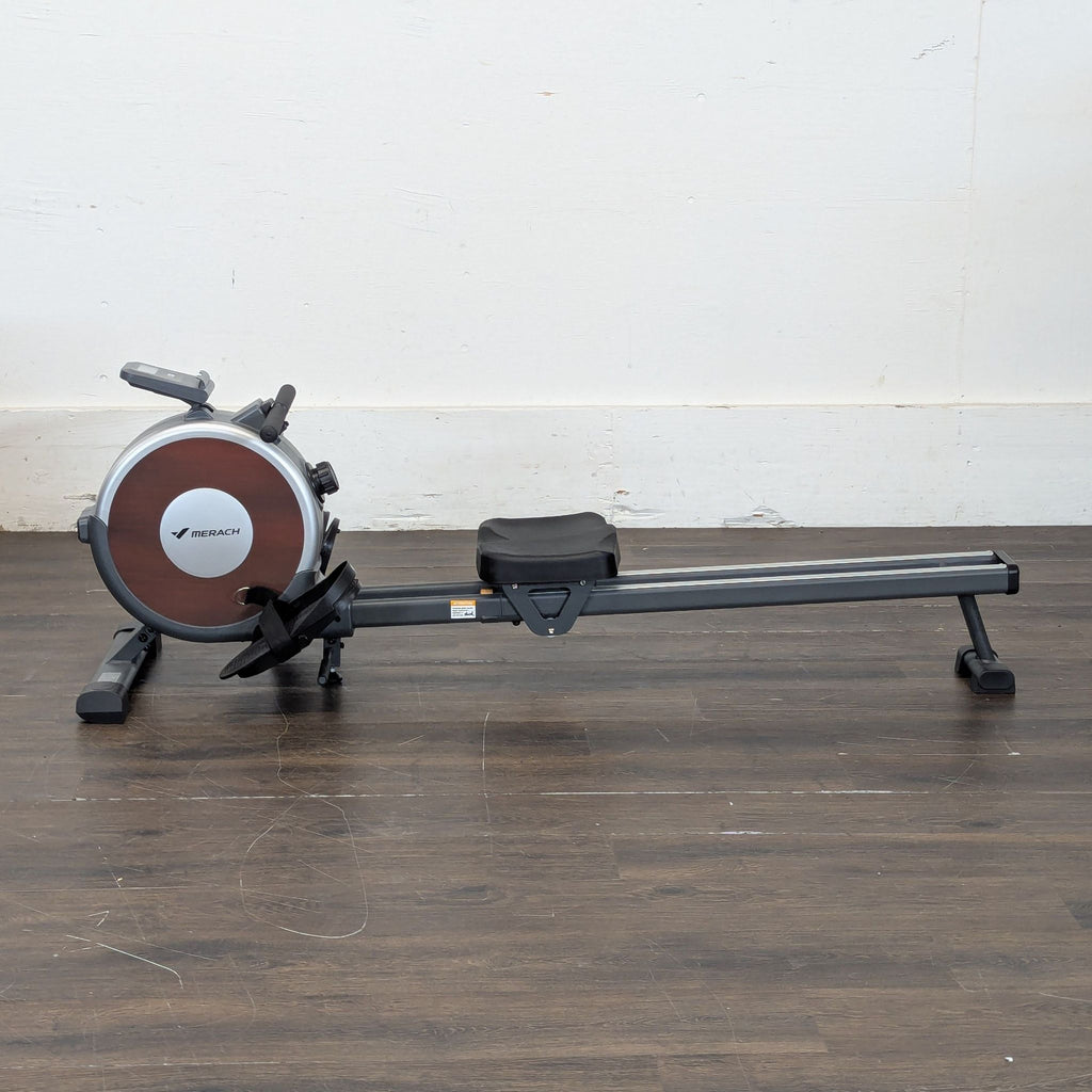 2. Compact rowing machine designed for home or gym workouts, featuring adjustable settings.  