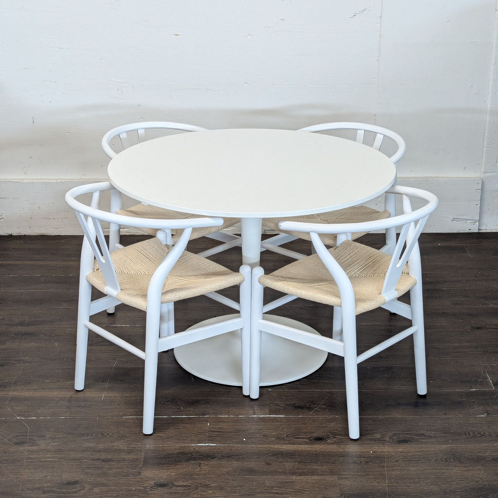 Modern coffee table and chairs set, perfect for casual dining or small apartments.