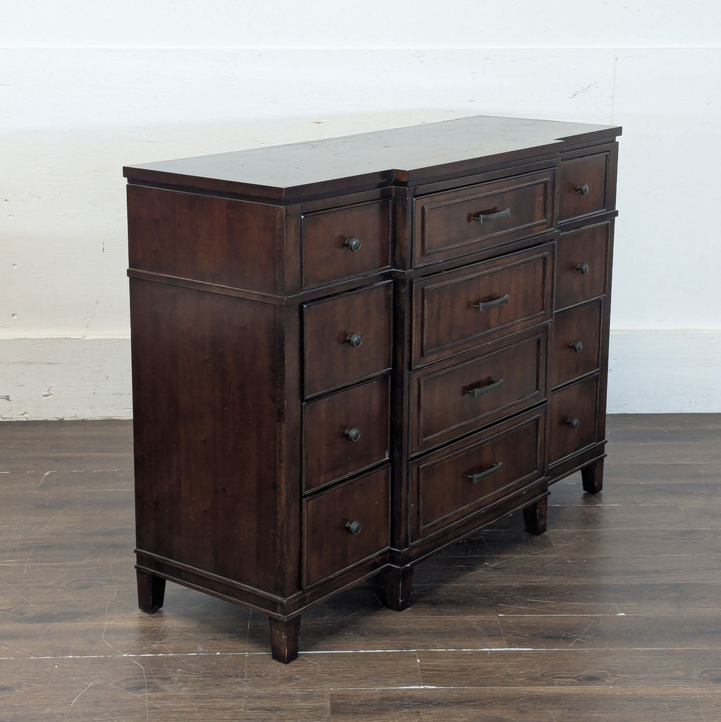 1. Modern wooden dresser with six drawers and minimalist metal handles, set against a white background.