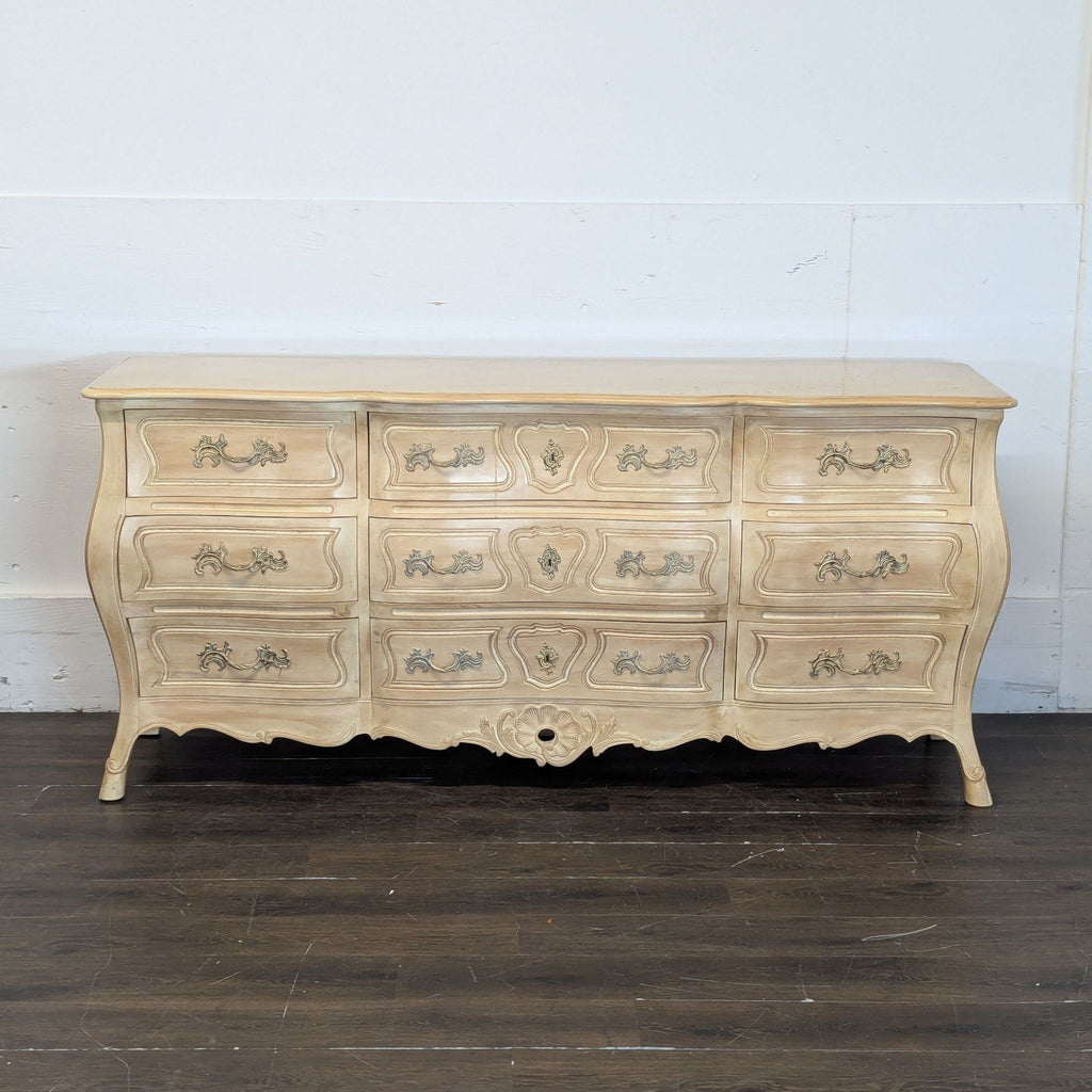 2. Sleek black dresser featuring spacious drawers and a smooth top, ideal for bedroom storage.