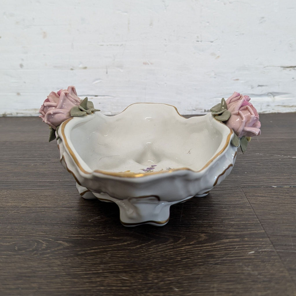 2. Tall glass vase featuring subtle etched patterns, perfect for displaying long-stemmed flowers.