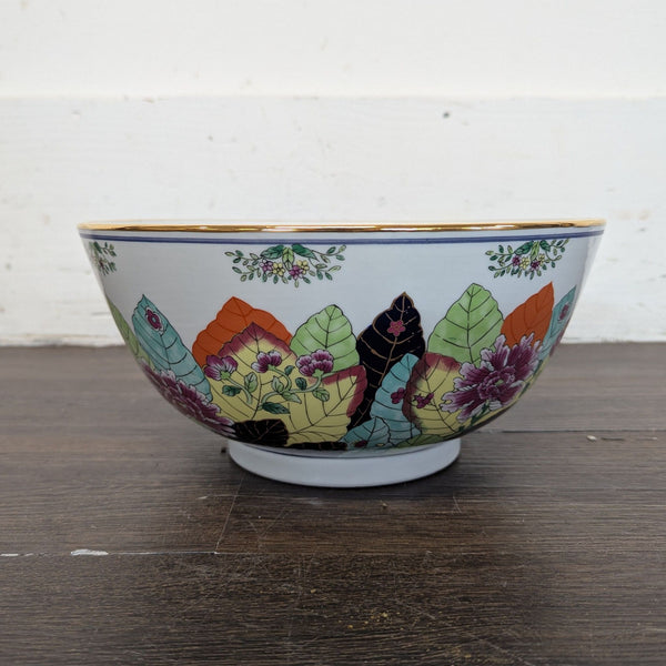 1. Decorative Gumps Japan bowl with colorful leaf and flower designs, gold rim, and floral accents on white background.  