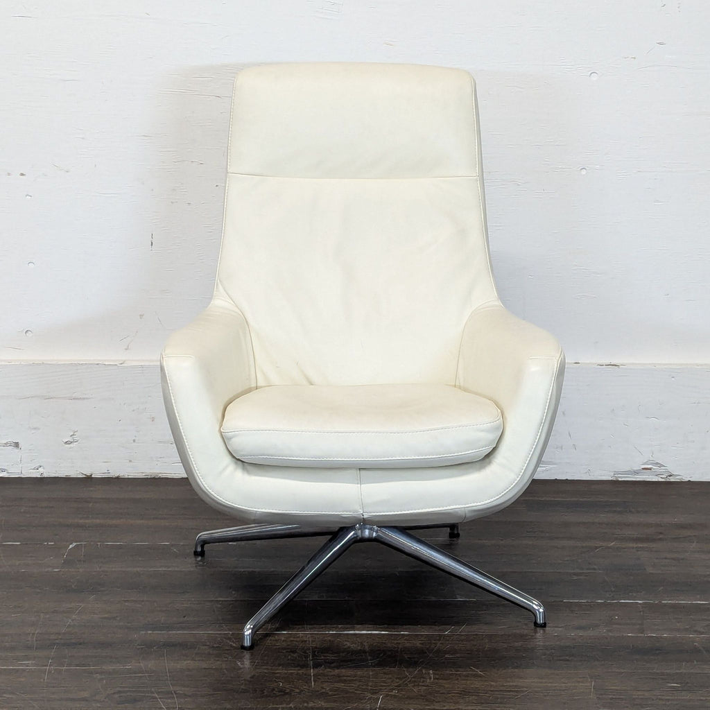 White leather-look swivel lounge chair from Ikea, high-back design, displayed on a plain background.  