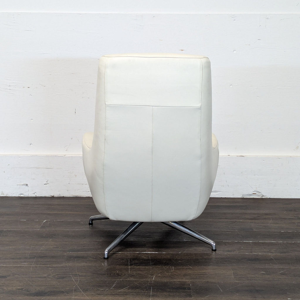 Ikea High-back white leather-look swivel lounge chair. 2019. I don't have the exact original price, but based on googling around it seems like it was roughly $400.