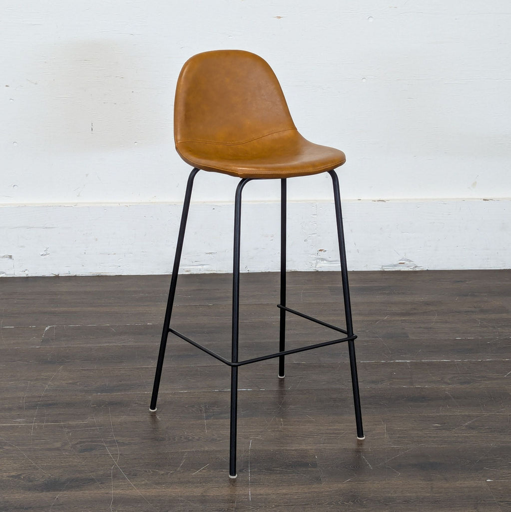 Collection of four bar stools with natural wood finish and sleek metal frames, viewed side by side.