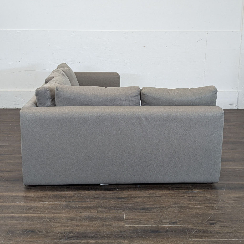 Room & Board sectional with pull out ottoman and under storage