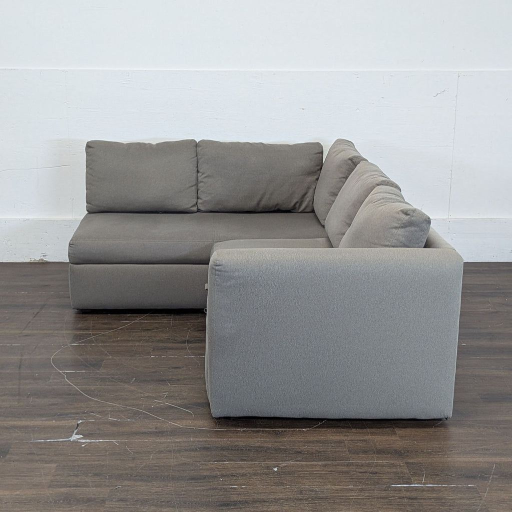 Room & Board sectional with pull out ottoman and under storage