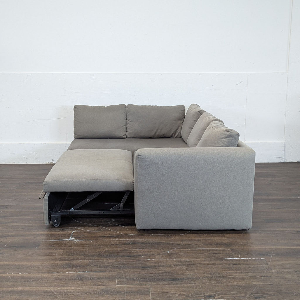 Room & Board sectional with pull out ottoman and under storage