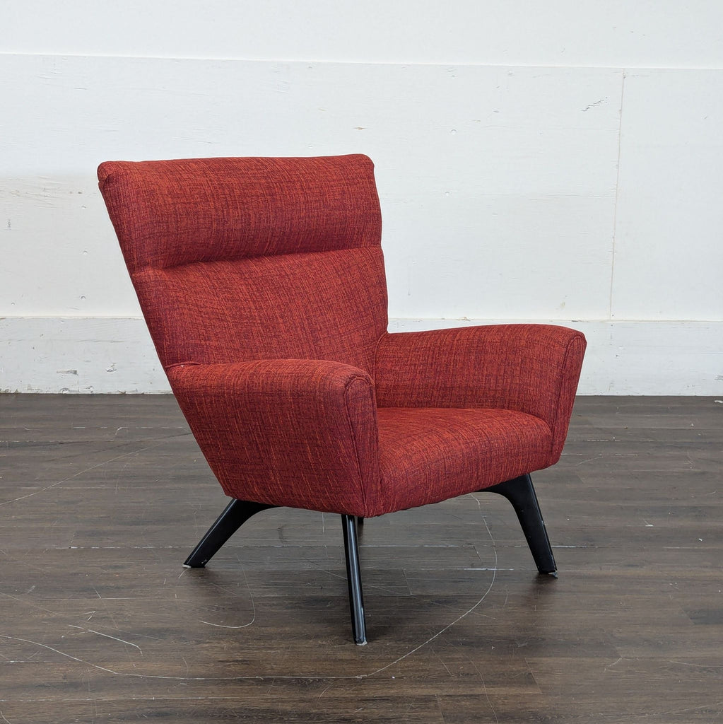 Contemporary Boden lounge chair with soft cushioning and sturdy frame, ideal for relaxing at home.
