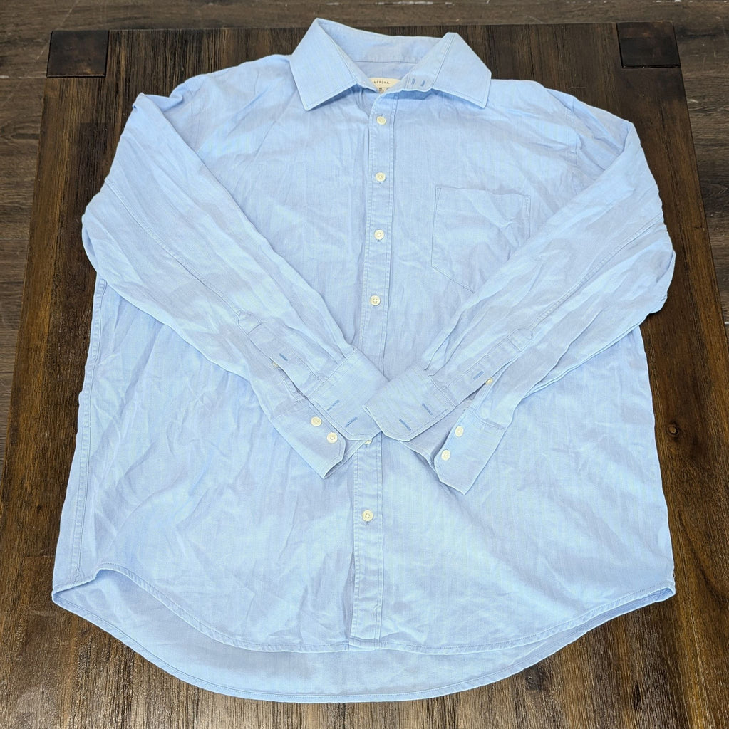 1. Light blue Merona men's long sleeve button-down shirt, front view, laid flat on a wooden surface.