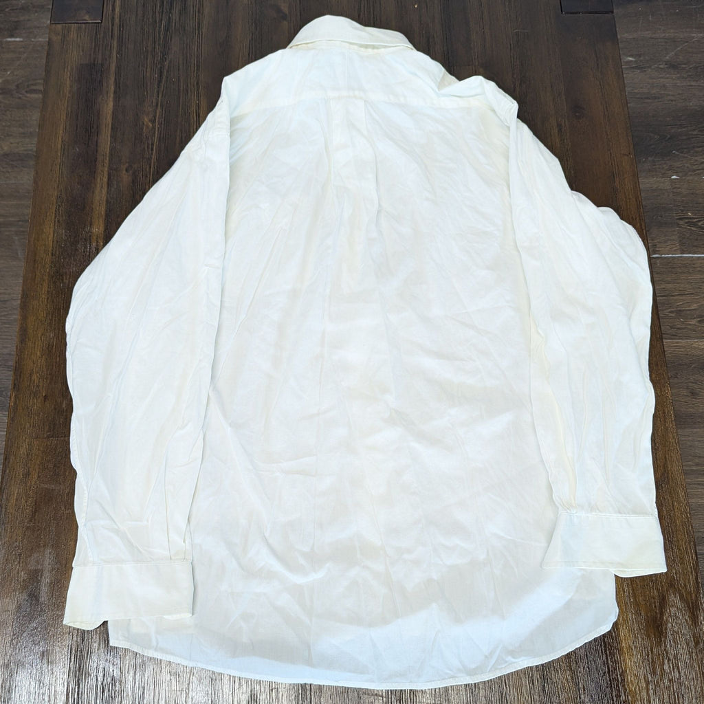 2. Back view of a Forsyth men's white dress shirt, showcasing the shirt's structure and long sleeves.