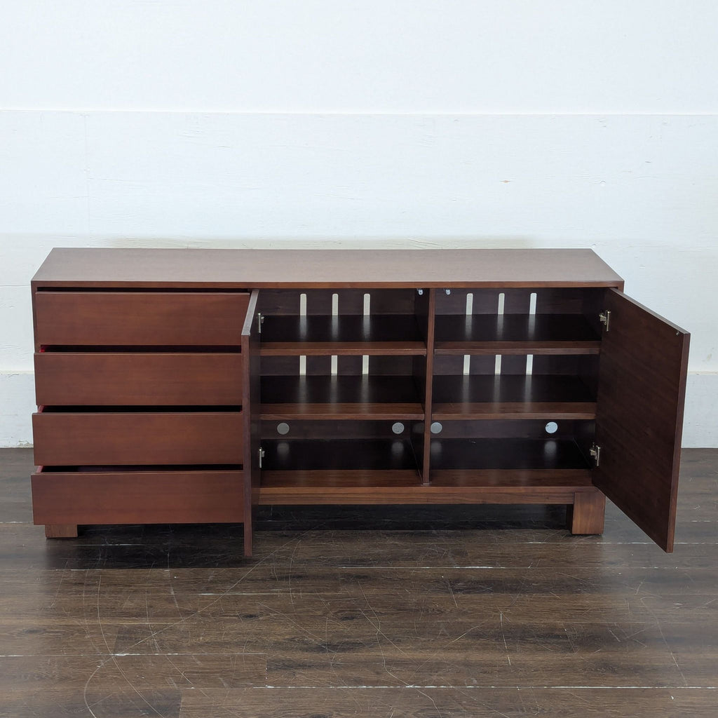 3. Open view of walnut sideboard by Mitchell Gold + Bob Williams displaying four drawers and spacious shelved cabinets.