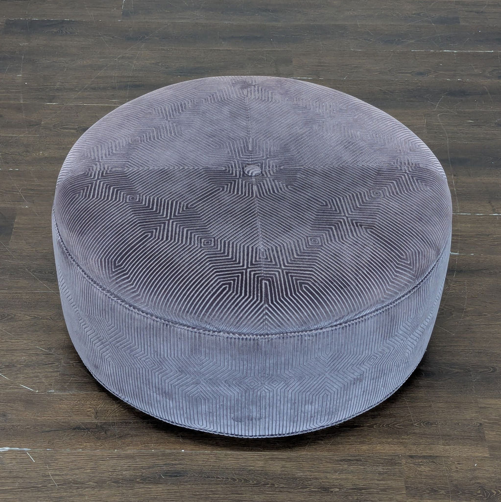 3. Top-angle view of a plush, patterned purple Lexington ottoman, ideal for use as a stool or bench.