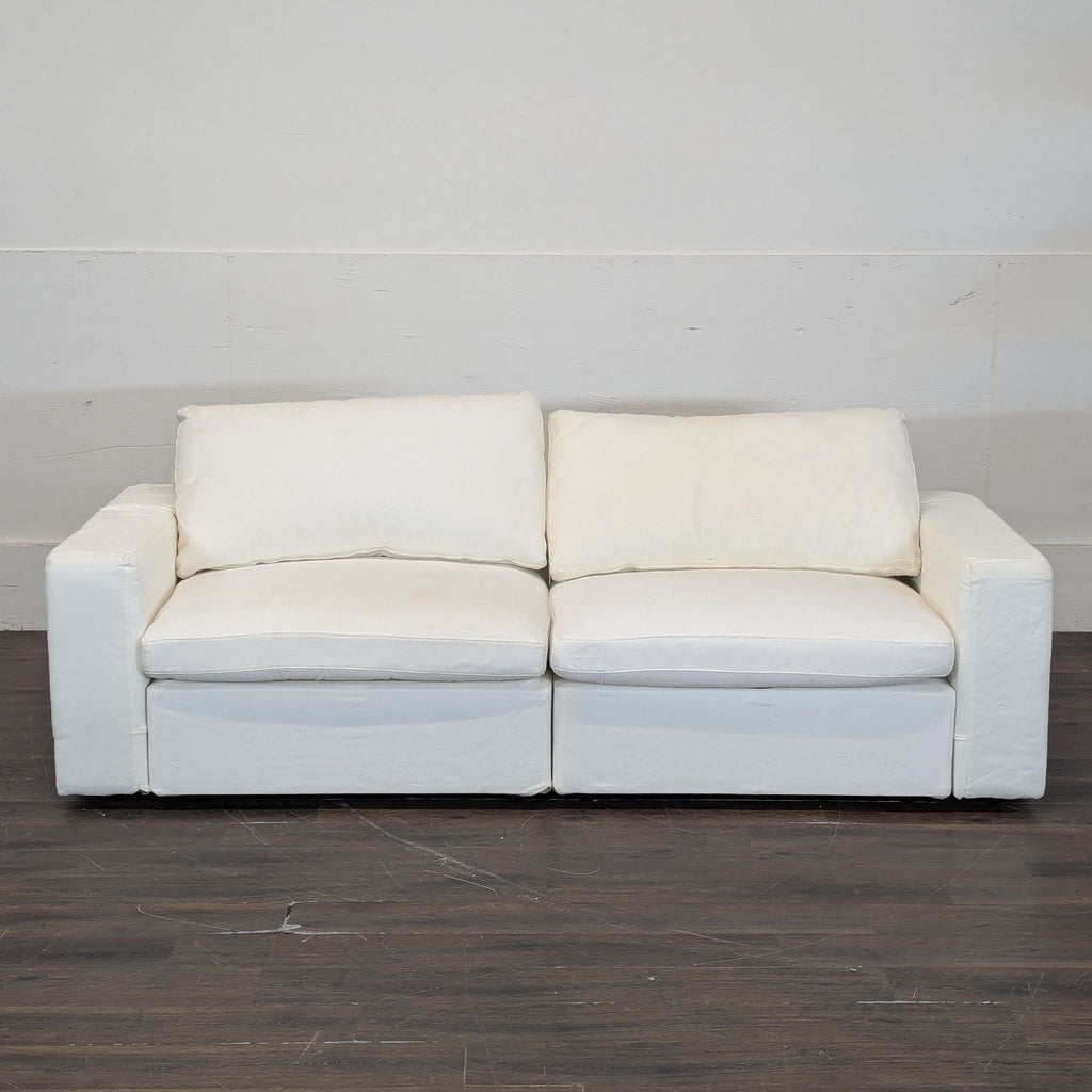 1. Modern 7th Avenue loveseat with plush cushions and sleek design, perfect for contemporary living rooms.