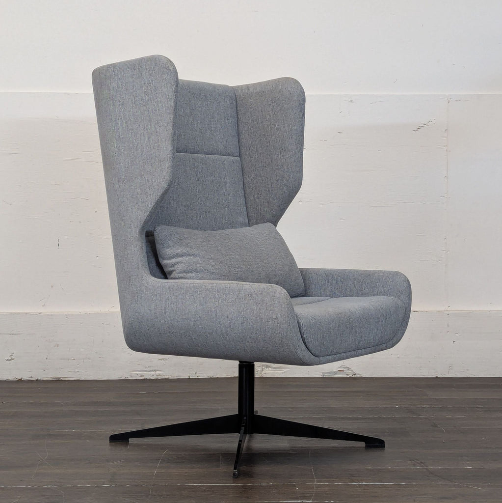 1. Modern lounge chair with a plush cushion and minimalist wooden legs in a cozy setting.