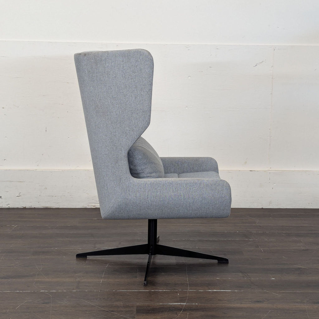 2. Contemporary lounge seating featuring soft fabric upholstery and an inviting, relaxed shape.