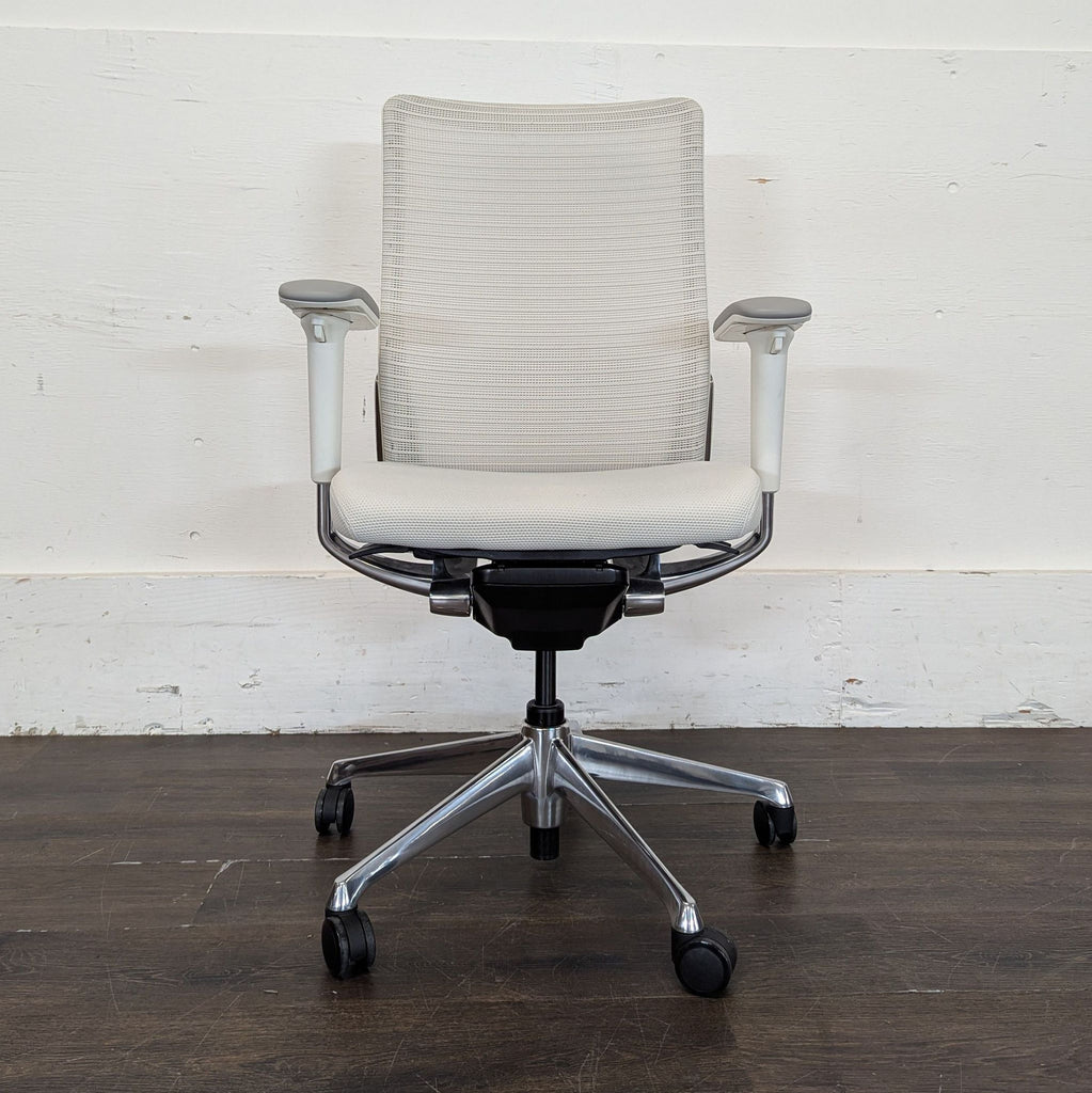 1. Modern wooden chair with cushioned seat, suitable for dining or office spaces.