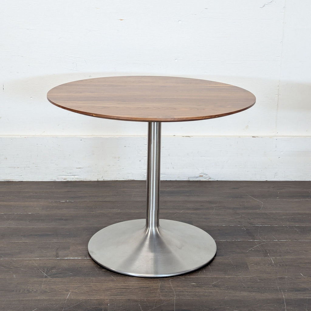 Room & Board	
36"Aria Table (Aluminum Base, Walnut Top)
Original Price $1459
Excellent Condition
https://www.roomandboard.com/catalog/dining-and-kitchen/tables/aria-tables

Room & Board
2X Pike Wood Chair
Original Price $249
Excellent Condition
https