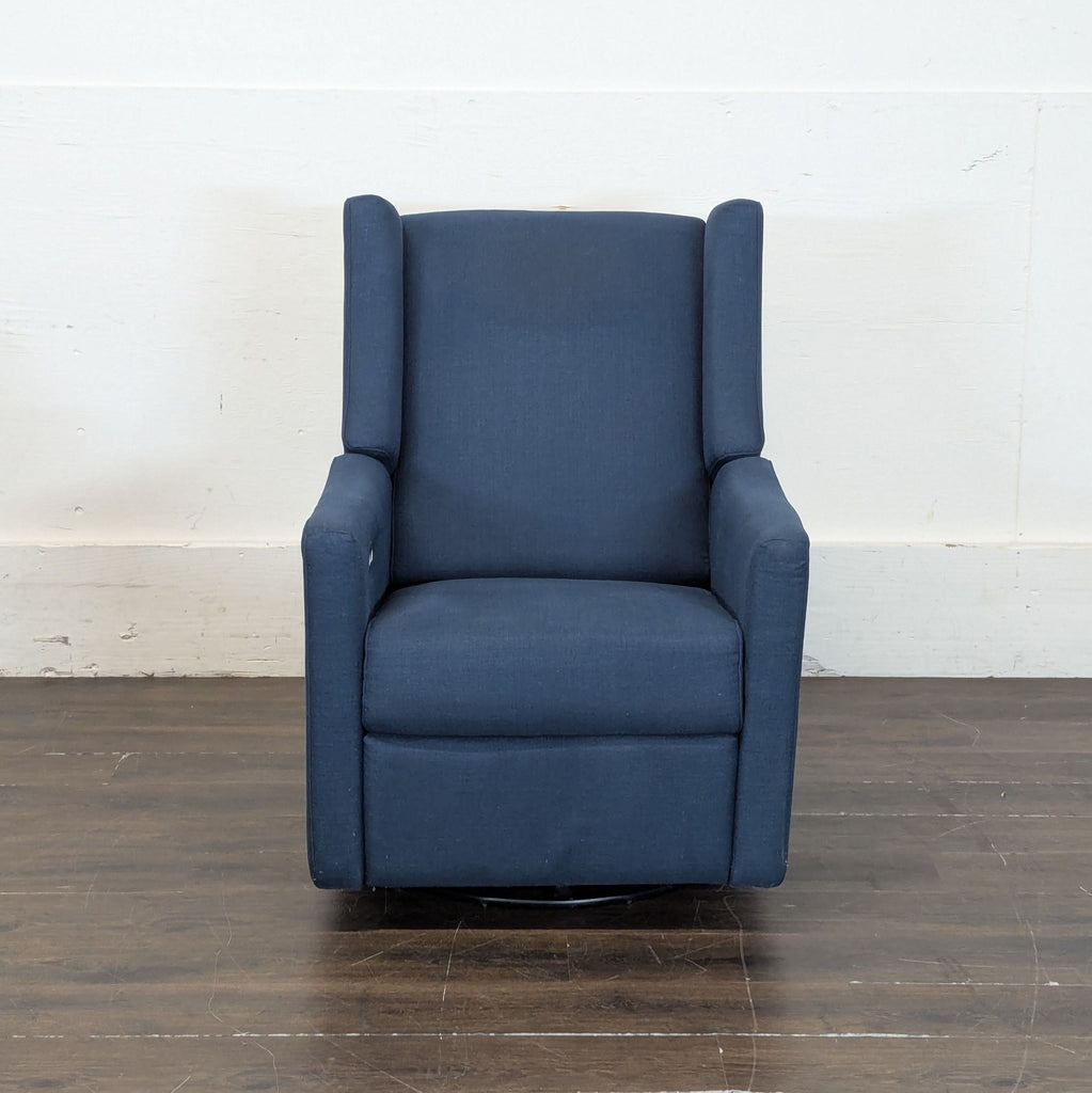 Modern lounge rocking chair, fabric upholstery, Babyletto Kiwi model, with minor creak, priced at $899.