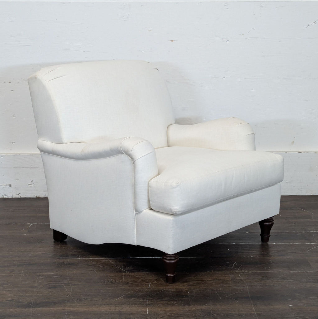2. Contemporary lounge seating featuring soft fabric upholstery and an inviting, relaxed shape.