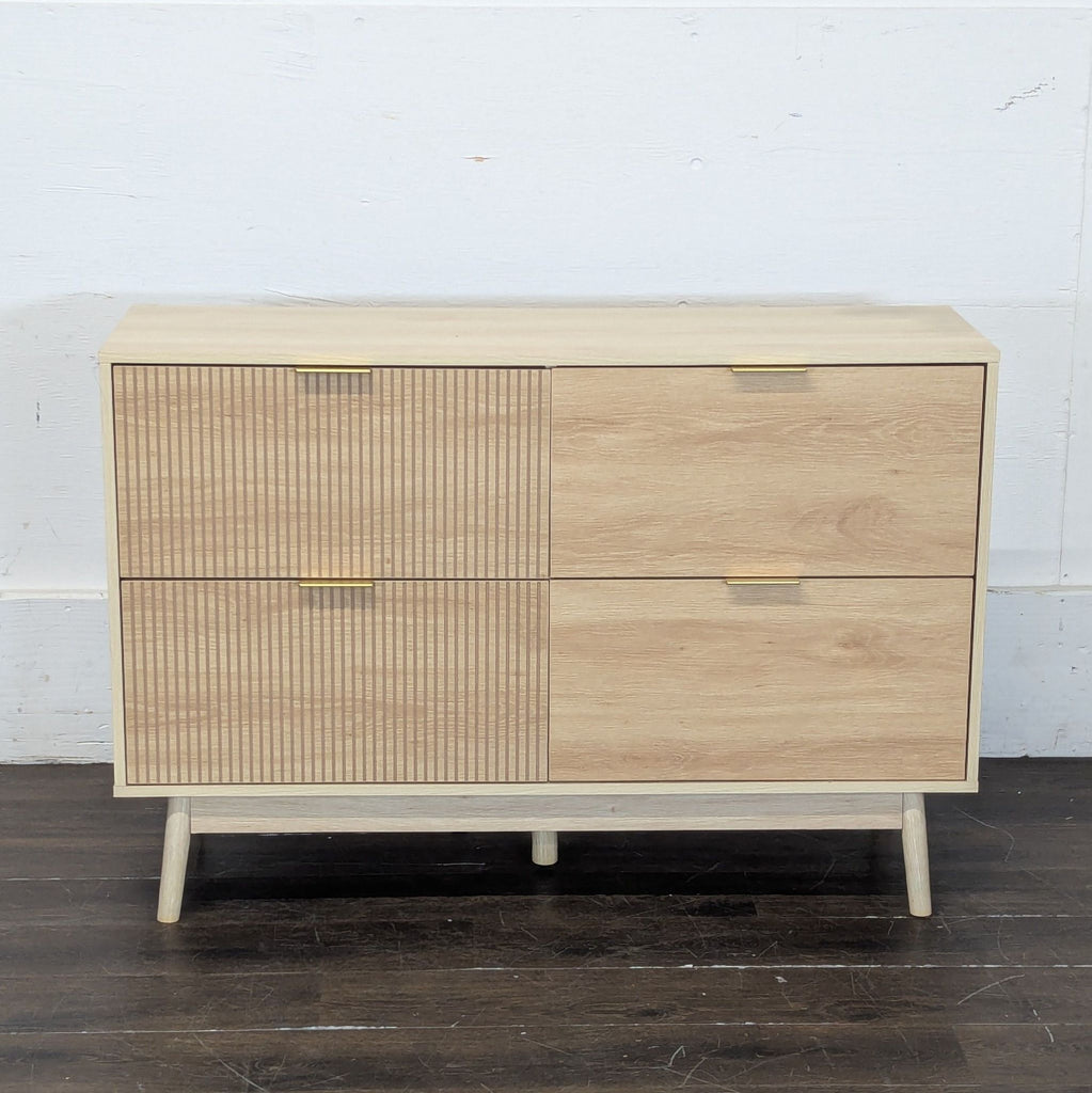 Set of two George Oliver 47.2" wide chest of drawers with sleek, vertical grooves and four spacious drawers.