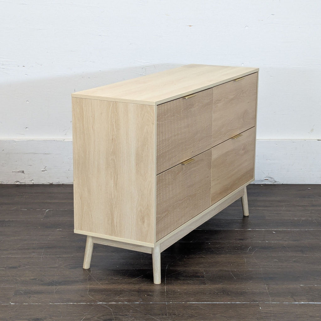 Two contemporary dressers with fluted fronts, 4 drawers each, perfect for organized storage in any room.