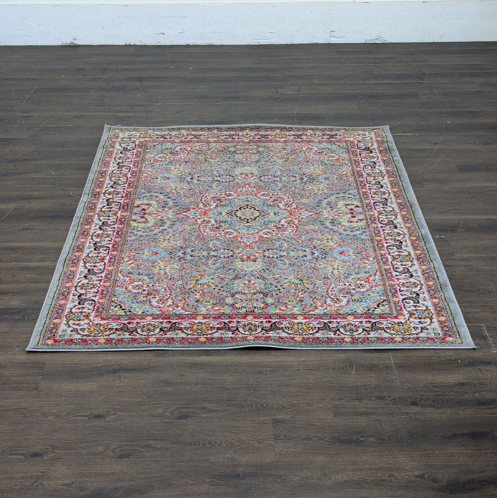 2. Modern 6x9 rug laid out, featuring subtle patterns and suitable for living room or bedroom decor.